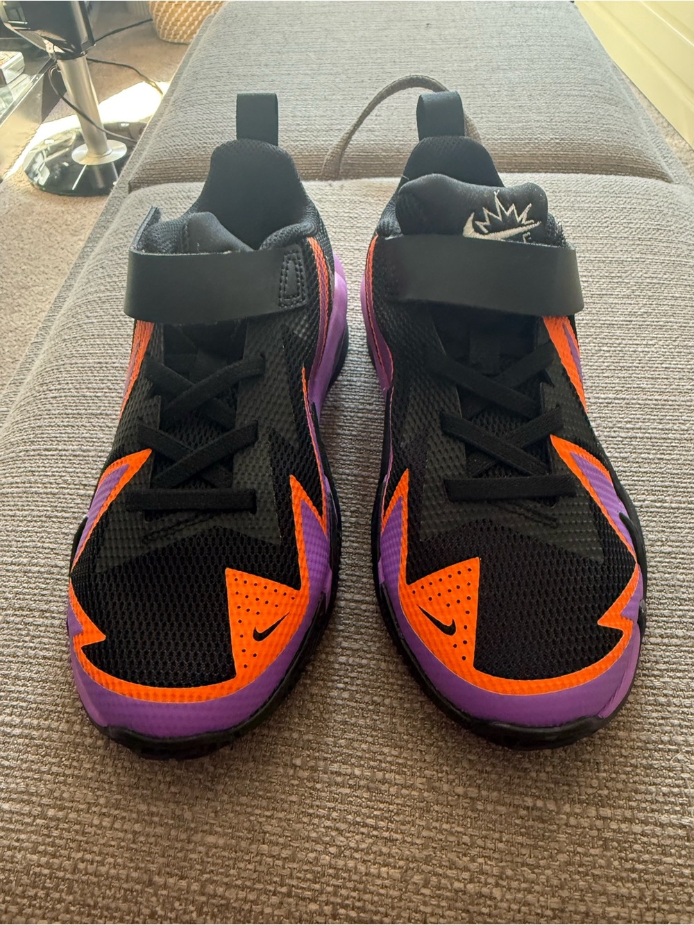 Nike Kids Black Sneakers with Orange and Purple Accents